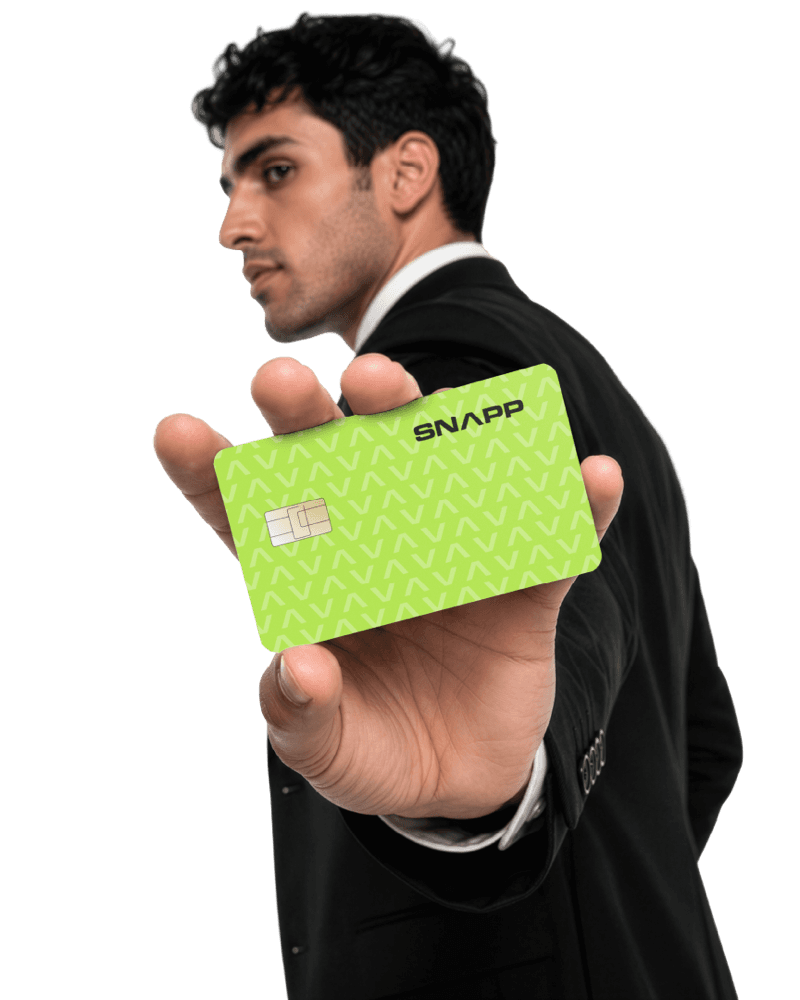 Model in a tailored suit holding a Snapp card toward the camera
